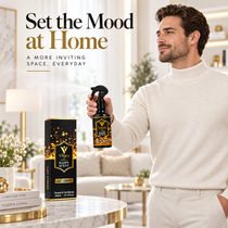 Man holding Vilara Happy Scent room spray in a bright ivory living room